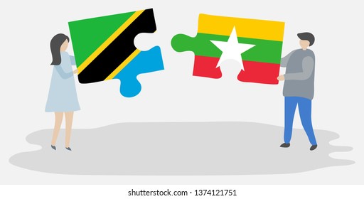 Couple holding two puzzles pieces with Tanzanian and Burmese flags. Tanzania and Myanmar national symbols together.