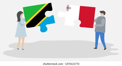 Couple holding two puzzles pieces with Tanzanian and Maltese flags. Tanzania and Malta national symbols together.