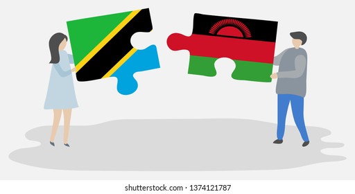 Couple holding two puzzles pieces with Tanzanian and Malawian flags. Tanzania and Malawi national symbols together.
