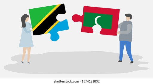 Couple holding two puzzles pieces with Tanzanian and Maldivian flags. Tanzania and Maldives national symbols together.