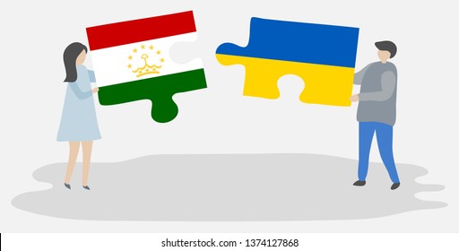 Couple holding two puzzles pieces with Tajikistani and Ukrainian flags. Tajikistan and Ukraine national symbols together.