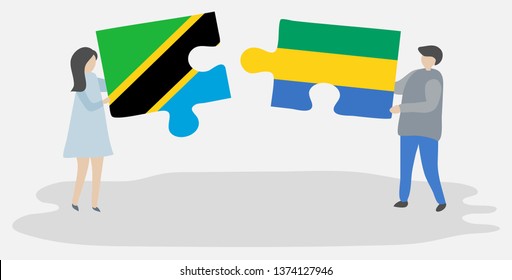Couple holding two puzzles pieces with Tanzanian and Gabonese flags. Tanzania and Gabon national symbols together.