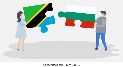 Couple holding two puzzles pieces with Tanzanian and Bulgarian flags. Tanzania and Bulgaria national symbols together.