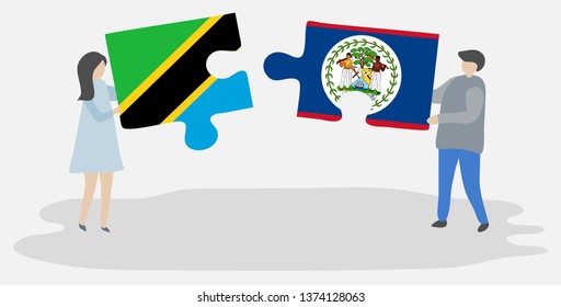 Couple holding two puzzles pieces with Tanzanian and Belizean flags. Tanzania and Belize national symbols together.
