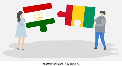Couple holding two puzzles pieces with Tajikistani and Guinean flags. Tajikistan and Guinea national symbols together.