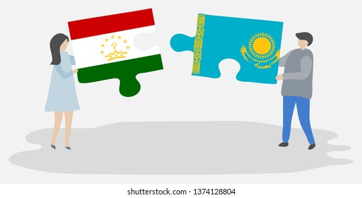 Couple holding two puzzles pieces with Tajikistani and Kazakh flags. Tajikistan and Kazakhstan national symbols together.