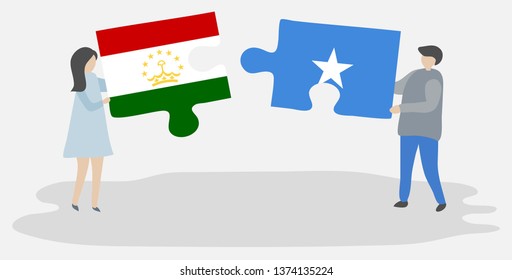 Couple holding two puzzles pieces with Tajikistani and Somali flags. Tajikistan and Somalia national symbols together.