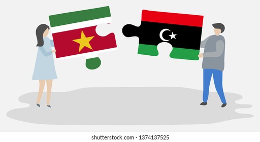 Couple holding two puzzles pieces with Surinamese and Libyan flags. Suriname and Libya national symbols together.