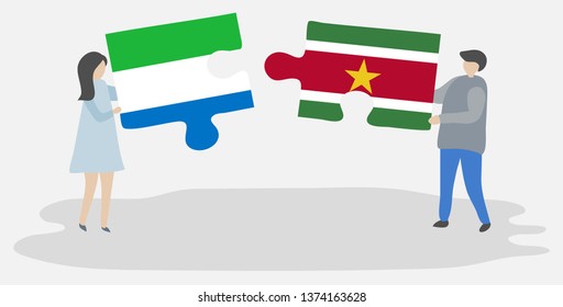 Couple holding two puzzles pieces with Sierra Leonean and Surinamese flags. Sierra Leone and Suriname national symbols together.