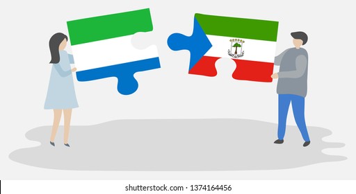 Couple holding two puzzles pieces with Sierra Leonean and Equatorial Guinean flags. Sierra Leone and Equatorial Guinea national symbols together.
