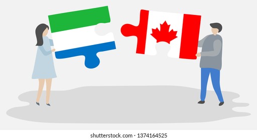 Couple holding two puzzles pieces with Sierra Leonean and Canadian flags. Sierra Leone and Canada national symbols together.