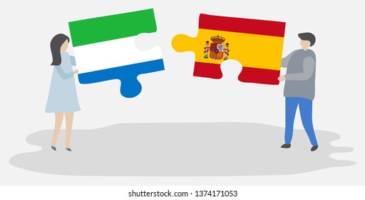 Couple holding two puzzles pieces with Sierra Leonean and Spanish flags. Sierra Leone and Spain national symbols together.