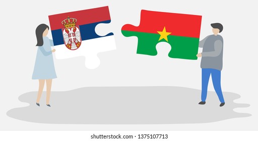 Couple holding two puzzles pieces with Serbian and Burkinabe flags. Serbia and Burkina Faso national symbols together.