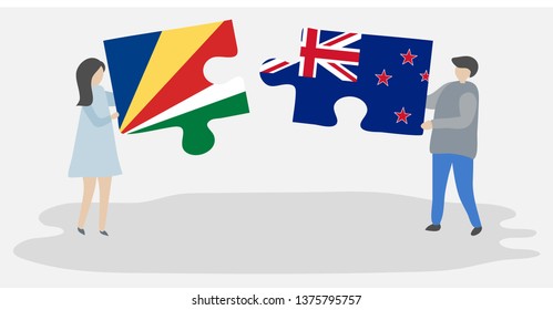 Couple holding two puzzles pieces with Seychellois and NZ flags. Seychelles and New Zealand national symbols together.