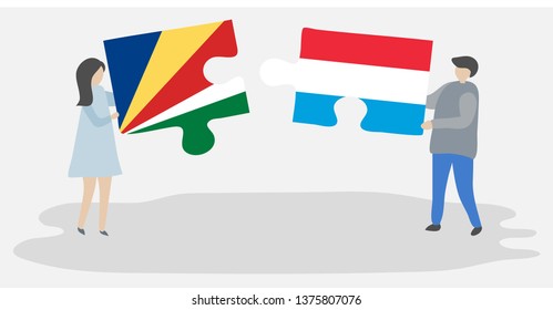 Couple holding two puzzles pieces with Seychellois and Luxembourgish flags. Seychelles and Luxembourg national symbols together.