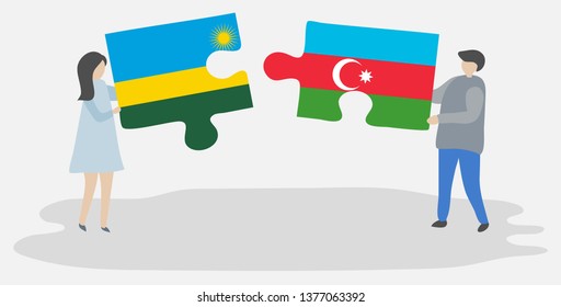 Couple holding two puzzles pieces with Rwandan and Azerbaijani flags. Rwanda and Azerbaijan national symbols together.