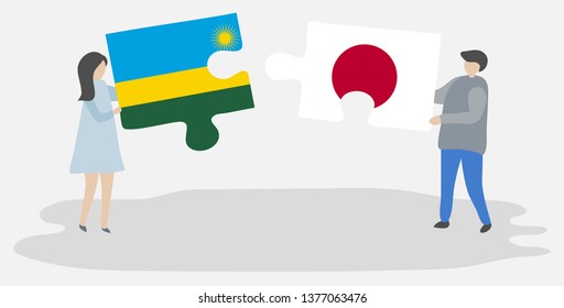 Couple holding two puzzles pieces with Rwandan and Japanese flags. Rwanda and Japan national symbols together.