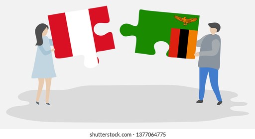 Couple holding two puzzles pieces with Peruvian and Zambian flags. Peru and Zambia national symbols together.