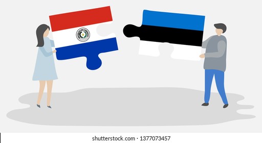 Couple holding two puzzles pieces with Paraguayan and Estonian flags. Paraguay and Estonia national symbols together.