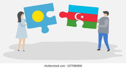 Couple holding two puzzles pieces with Palauan and Azerbaijani flags. Palau and Azerbaijan national symbols together.