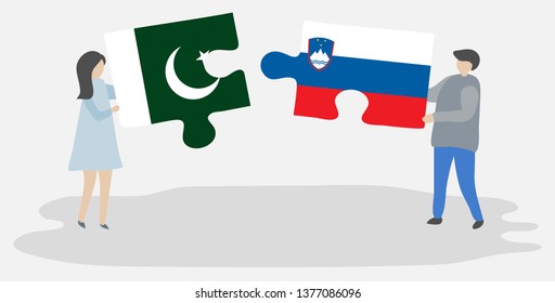 Couple holding two puzzles pieces with Pakistani and Slovenian flags. Pakistan and Slovenia national symbols together.