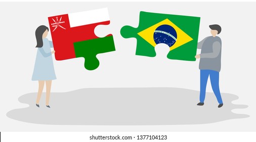 Couple holding two puzzles pieces with Omani and Brazilian flags. Oman and Brazil national symbols together.