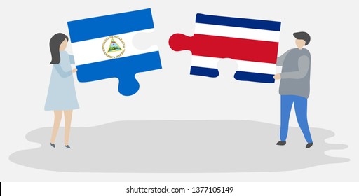 Couple holding two puzzles pieces with Nicaraguan and Costa Rican flags. Nicaragua and Costa Rica national symbols together.