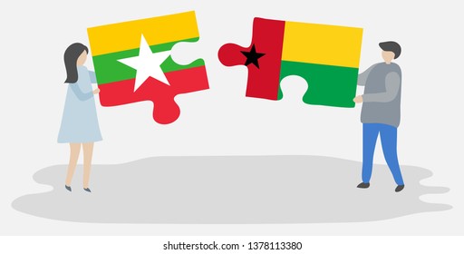 Couple holding two puzzles pieces with Burmese and Bissau-Guinean flags. Myanmar and Guinea-Bissau national symbols together.