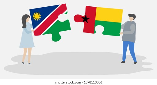 Couple holding two puzzles pieces with Namibian and Bissau-Guinean flags. Namibia and Guinea-Bissau national symbols together.
