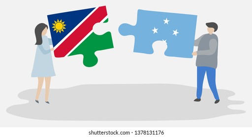 Couple holding two puzzles pieces with Namibian and Micronesian flags. Namibia and Micronesia national symbols together.
