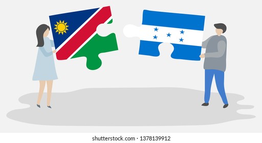 Couple holding two puzzles pieces with Namibian and Honduran flags. Namibia and Honduras national symbols together.