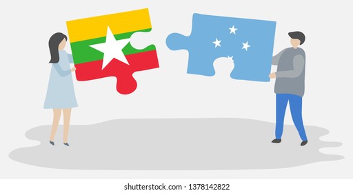 Couple holding two puzzles pieces with Burmese and Micronesian flags. Myanmar and Micronesia national symbols together.