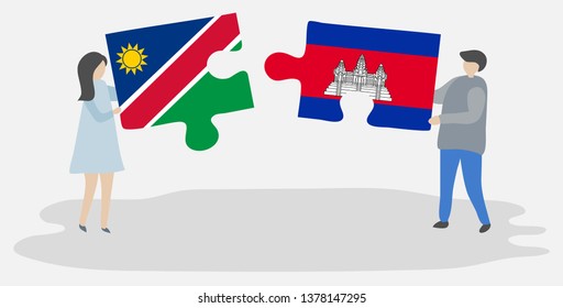 Couple holding two puzzles pieces with Namibian and Cambodian flags. Namibia and Cambodia national symbols together.