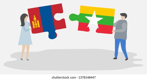 Couple holding two puzzles pieces with Mongolian and Burmese flags. Mongolia and Myanmar national symbols together.
