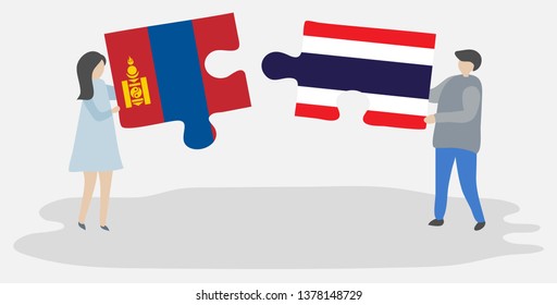 Couple holding two puzzles pieces with Mongolian and Thai flags. Mongolia and Thailand national symbols together.
