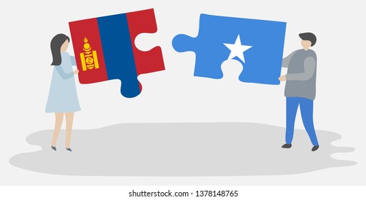 Couple holding two puzzles pieces with Mongolian and Somali flags. Mongolia and Somalia national symbols together.