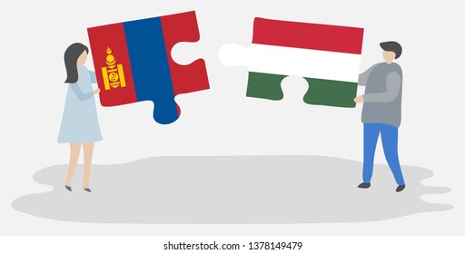Couple holding two puzzles pieces with Mongolian and Hungarian flags. Mongolia and Hungary national symbols together.