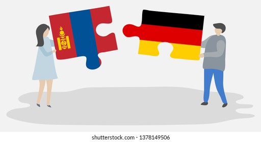 Couple holding two puzzles pieces with Mongolian and German flags. Mongolia and Germany national symbols together.