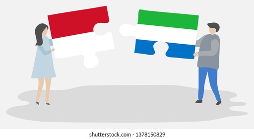 Couple holding two puzzles pieces with Monegasque and Sierra Leonean flags. Monaco and Sierra Leone national symbols together.