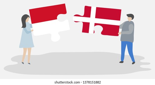 Couple holding two puzzles pieces with Monegasque and Danish flags. Monaco and Denmark national symbols together.