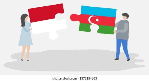 Couple holding two puzzles pieces with Monegasque and Azerbaijani flags. Monaco and Azerbaijan national symbols together.