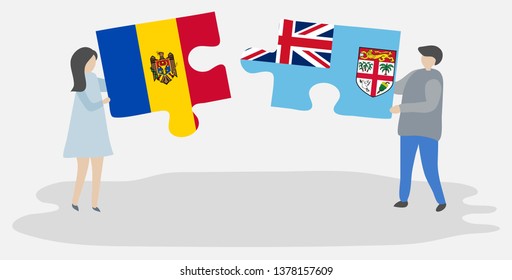 Couple holding two puzzles pieces with Moldovan and Fijian flags. Moldova and Fiji national symbols together.