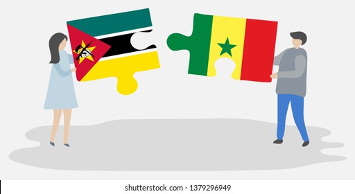 Couple holding two puzzles pieces with Mozambican and Senegalese flags. Mozambique and Senegal national symbols together.