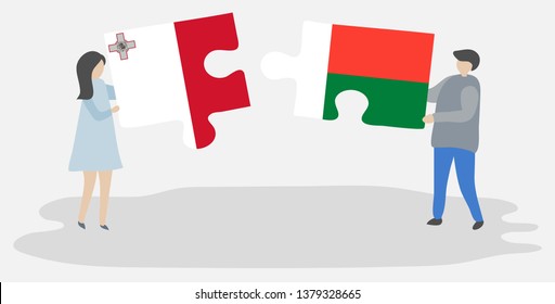 Couple holding two puzzles pieces with Maltese and Malagasy flags. Malta and Madagascar national symbols together.
