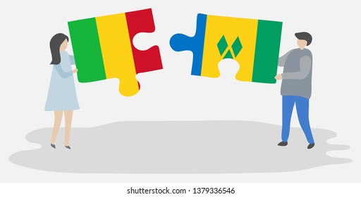 Couple holding two puzzles pieces with Malian and Vincentian flags. Mali and Saint Vincent and the Grenadines national symbols together.