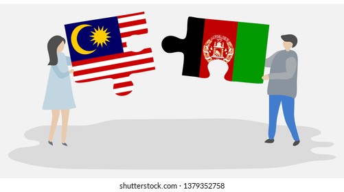 Couple holding two puzzles pieces with Malaysian and Afghan flags. Malaysia and Afghanistan national symbols together.