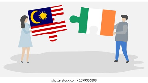 Couple holding two puzzles pieces with Malaysian and Irish flags. Malaysia and Ireland national symbols together.