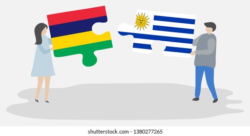 Couple holding two puzzles pieces with Mauritian and Uruguayan flags. Mauritius and Uruguay national symbols together.