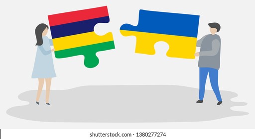 Couple holding two puzzles pieces with Mauritian and Ukrainian flags. Mauritius and Ukraine national symbols together.