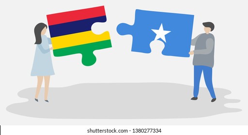 Couple holding two puzzles pieces with Mauritian and Somali flags. Mauritius and Somalia national symbols together.